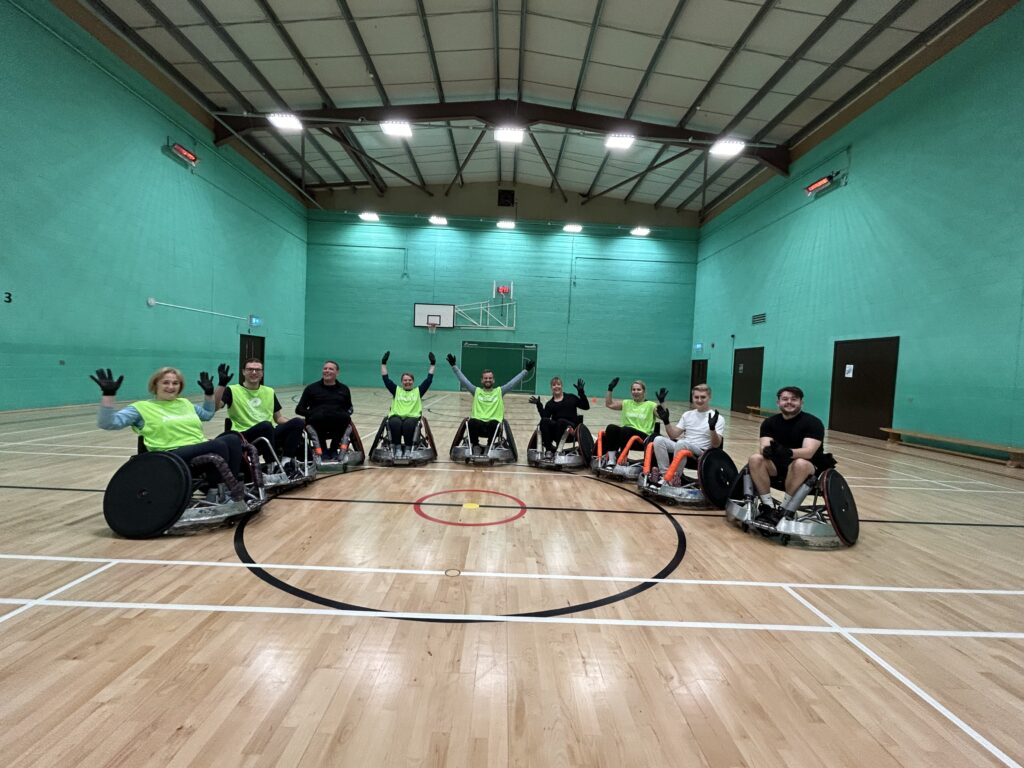 The Daines Kapp team in a team photo after playing wheelchair rugby